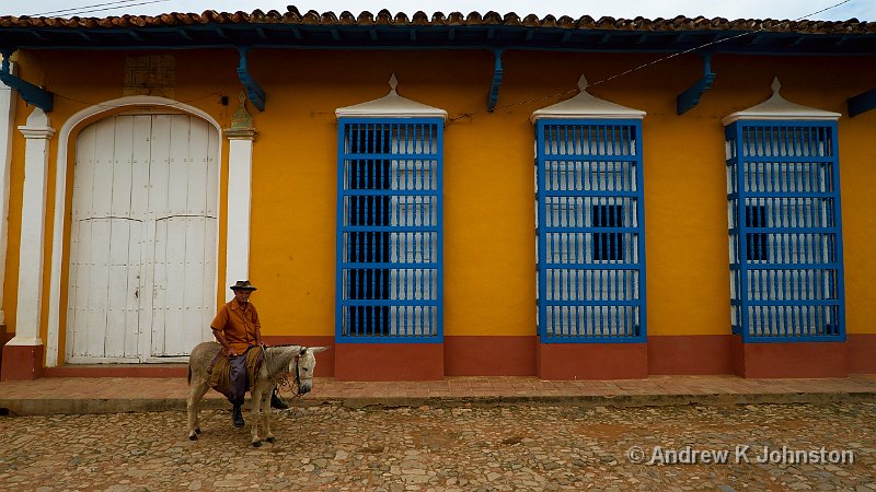 1110_7D_3832.jpg - Donkey rider and typical Trinidad architecture