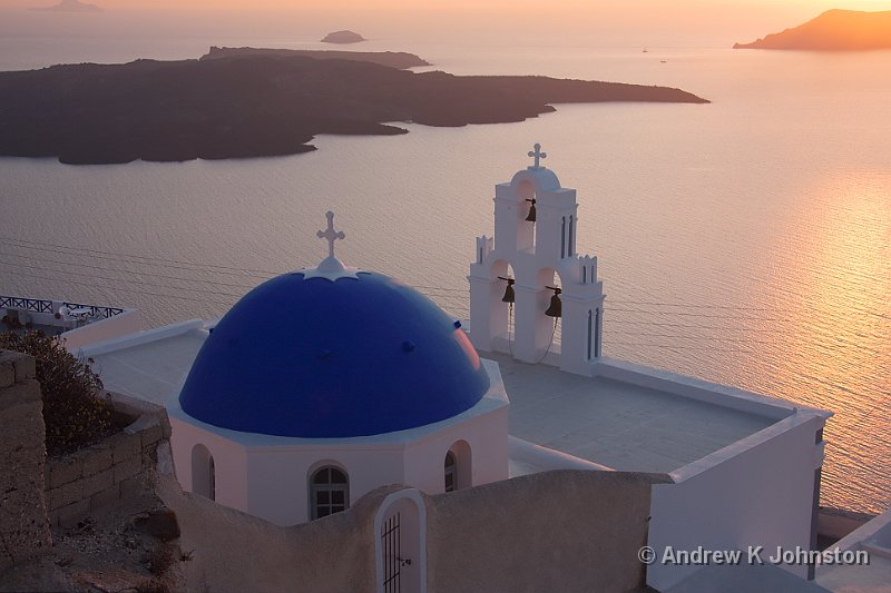 1009_40D_9654.jpg - Church domes against the caldera sunset at Firostephani, Santorini. This is the one on all the guide books. We tried for ages to find it - in the end I worked out its position to about 100m by working out on the map where you woulld get this angle between the two islands in the caldera.