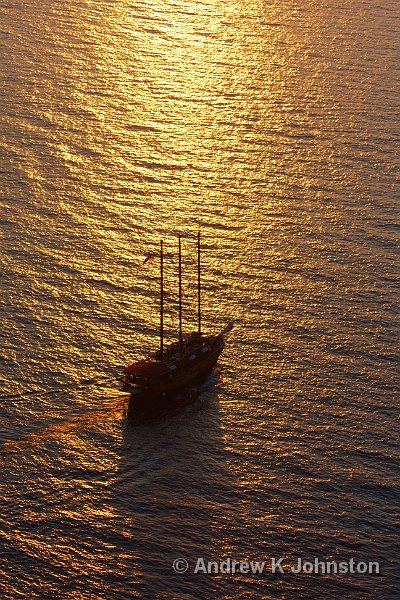 0909_40D_9335.JPG - Sailing ship against sunlit water in the Santorini caldera